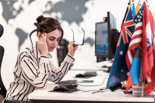 Beautiful Shocked and Annoyed Young Woman Looking at her Laptop. Sad Operator Agent Woman Working from Home in a Call Center. High-quality photo