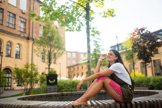 Young woman on a park bench posing