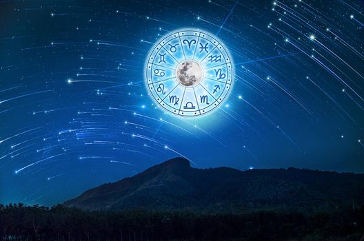 Zodiac signs inside of horoscope circle. Astrology in the sky with many stars and moons  astrology and horoscopes concept