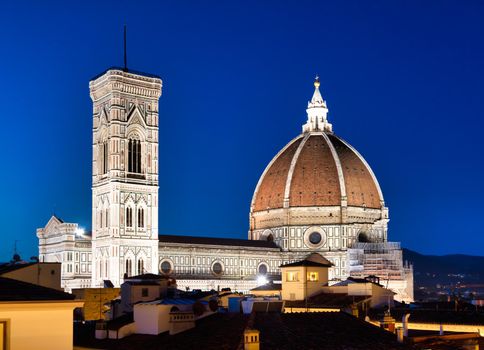 Florence Duomo and Campanile - Bell Tower - architecture illuminated by night, Italy. Urban scene in exterior - nobody