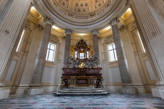VENARIA REALE, ITALY - CIRCA MAY 2021: sacred catholic altar in Baroque style and cupola. Day light.