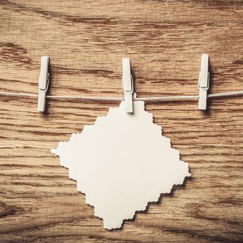 empty blank piece of paper on wooden background. photo with copy space