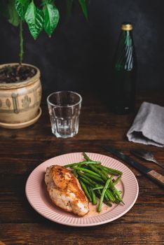 Oven-baked Chicken Breasts and Green Beans Fried with Garlic and Thyme