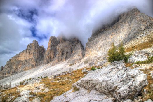 Panoramic view of the Three Peaks of Lavaredo Italy seen on a cloudy day 