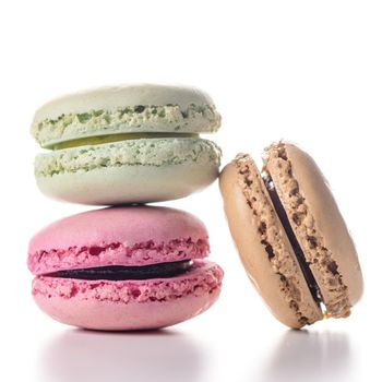 Three macaroons on white background.