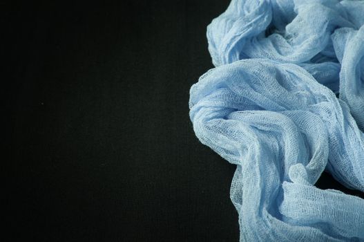 Hand dyed  blue gauze fabric. Boho style gauze runner, rustic tablecloth for wedding decor on black background