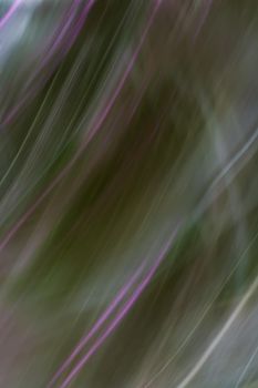 Abstract purple green hazy background. Light blur. Oblique lines and waves. Backdrop. Vertical banner.