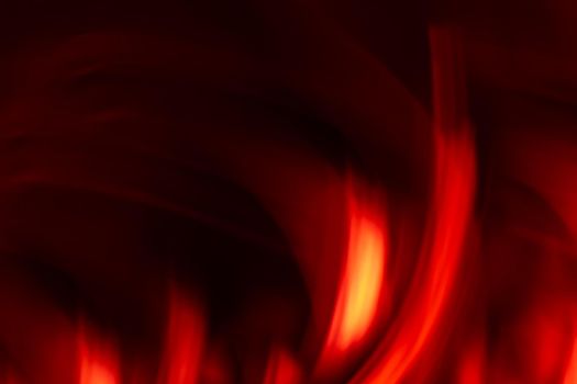 Abstract hot shiny red flame on black background. Soft blur. Backdrop banner. Burning bonfire.