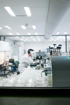 Scientists in the laboratory are developing vaccines against coronavirus COVID-19 Blurred photo