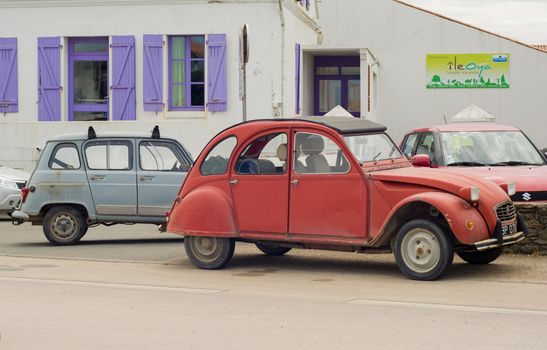 ILE D'YEU, FRANCE - MAY 25, 2016: Old vintage cars Citroen on the street of city in France