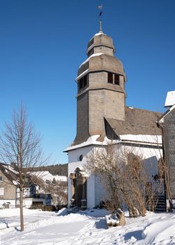 Chapel of village Nordenau during winter, Schmallenberg, Sauerland, Germany