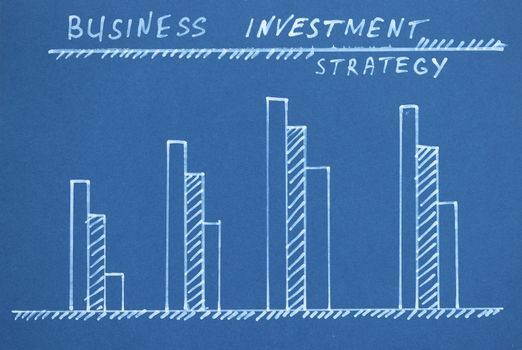 Chart growth indicators are drawn on blue background closeup. Business investment concept