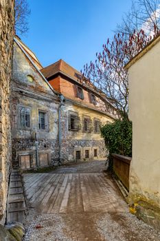 Old town view of narrow aisle in city Jindrichuv Hradec, a town in the Czech Republic in the region South Bohemia. The old town view.