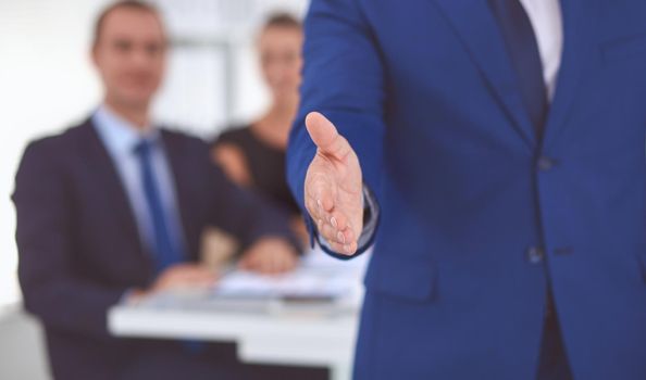 Closeup of a business handshake .