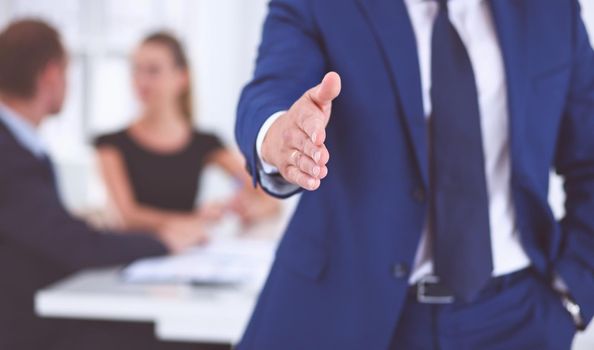 Closeup of a business handshake .