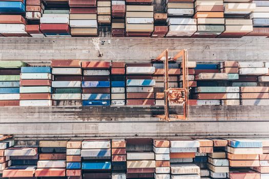 Aerial view of shipping container port terminal. Colourful pattern of containers in harbor. Maritime logistics global inport export trade transportation