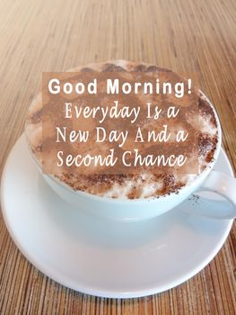 Inspirational quote on a coffee cup - Good morning, everyday is a new day and a second chance.