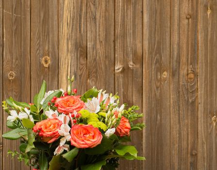 bouquet of flowers on a old wooden background