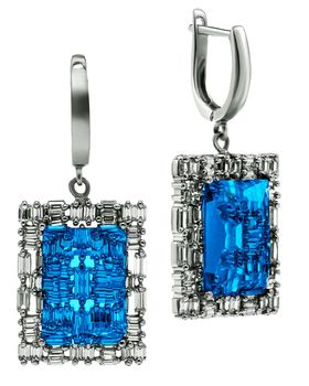 Pair of sapphire earrings isolated on white background. High quality photo