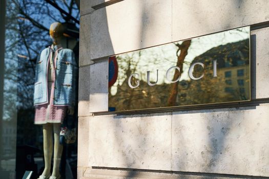 Brussels, Belgium - April 1 2019: Logo of Gucci by the store showcase