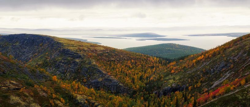 North Russia Khibiny mountains in autumn mountain lake and forest. Murmansk region. photo