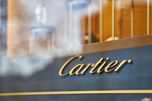 Brussels, Belgium - April 1 2019: Logo of Cartier on the store showcase