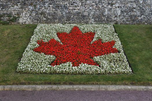 Canadian flag made of flowers as a memory of Canadian soldiers during the disembarkation on August 19, 1942