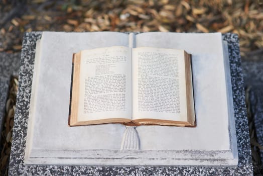 Shot of a gravestone in a cemetery