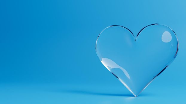 Valentine's Day 3d illustration - rendering. Single transparent heart made out of glass isolated on blue background. Layout with negative space for copy