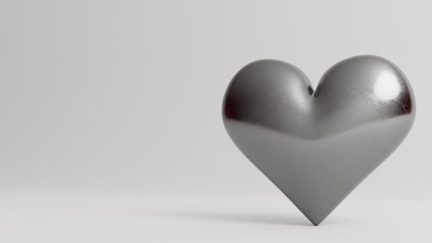 Valentine's Day 3d illustration - rendering. Single silver heart isolated on white background. Layout with negative space for copy