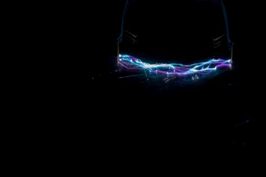 blue and purple taser electric discharge on black. High quality photo