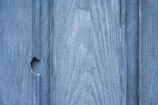 Imperfect blue wooden door background