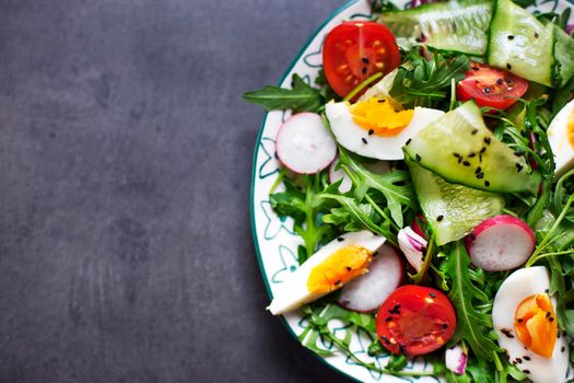 Greek salad on the gray copy space - Stock image