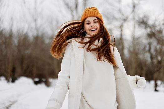 young woman Walk in winter field landscape outdoor entertainment Lifestyle. High quality photo