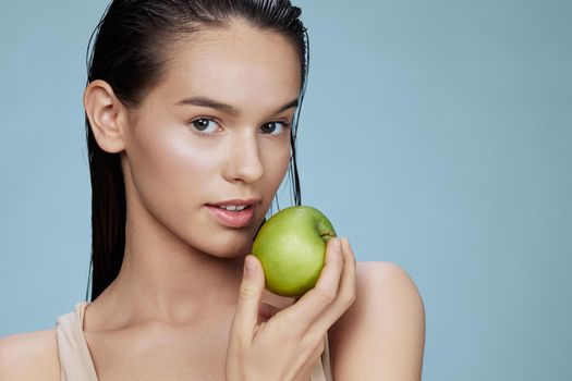 brunette happy smile green apple health isolated background. High quality photo