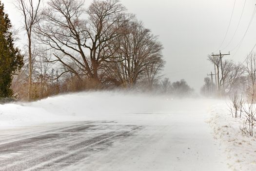 Snow Squall Conditions on a Rural Country Road in Ontario Canada. High quality photo