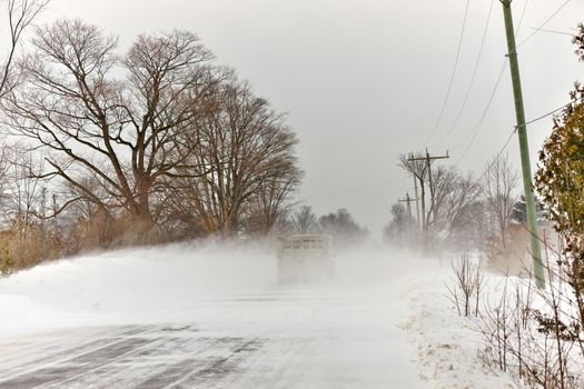 Snow Squall Conditions on a Rural Country Road in Ontario Canada. High quality photo