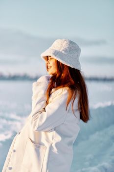 beautiful woman smile Winter mood walk white coat Lifestyle. High quality photo