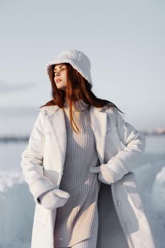 woman smile Winter mood walk white coat Lifestyle. High quality photo