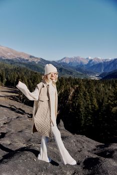 woman nature autumn style travel to the mountains lifestyle. High quality photo