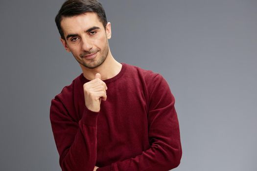 manager in a sweater posing hand gesture emotions business and office concept. High quality photo