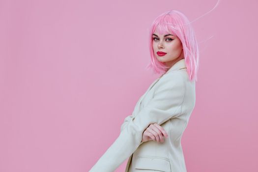 Pretty young female in White blazer pink hair Glamor Cosmetics color background unaltered. High quality photo