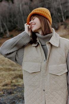 portrait of a woman trees without leaves travel fresh air life style. High quality photo