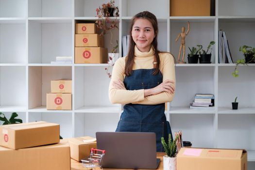 Asian small business owner working at home office. Business retail market and online sell marketing delivery, SME e-commerce concept