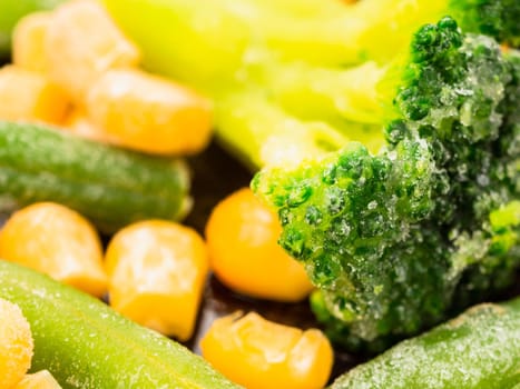 frozen vegetables broccoli corn green beans closeup.