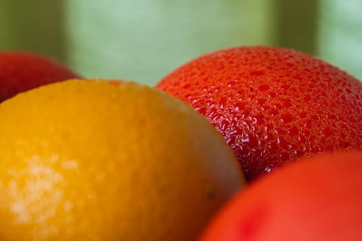 still life of a variety of colored Easter eggs in rustic style blur background. horizontal orientation