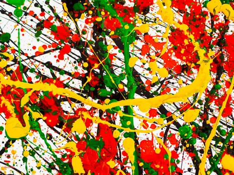 an abstraction with splashes of black and red and green and yellow paint on a white background