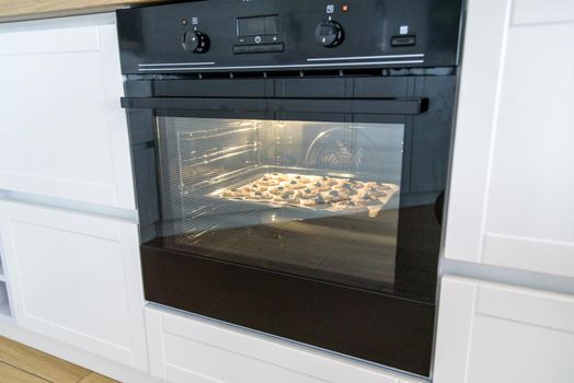 baking cookies at home in a kitchen.