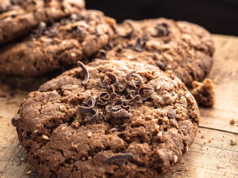 oatmeal cookies with chocolate sprinkle on a wooden board. close-up.