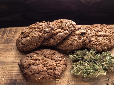 hemp and textured cookies on a wooden board. close-up.